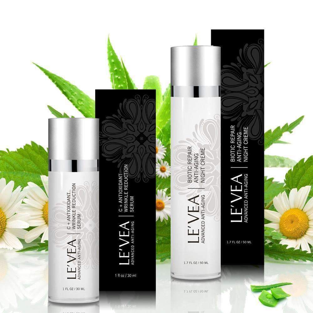 LEVEA anti-aging night duo—serum and cream beside box, botanical accents.