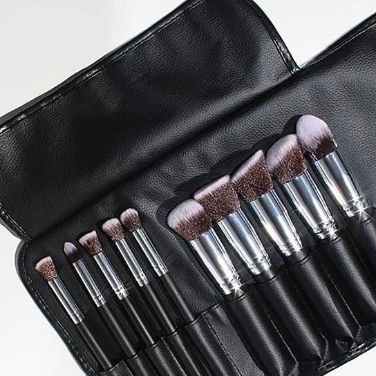 Makeup brush set stored neatly in a black travel pouch