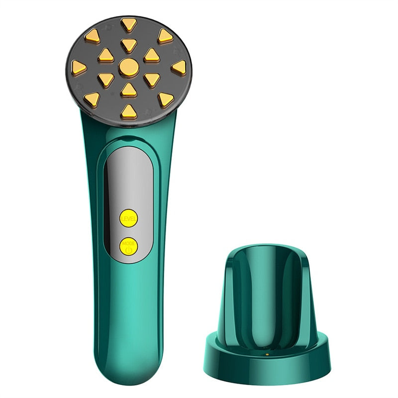 Emerald EMS facial massager with LED head and charging base.