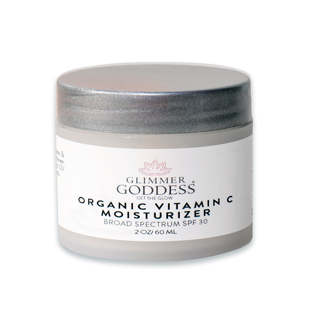 Vitamin C night cream jar with silver lid and white label, studio packshot.
