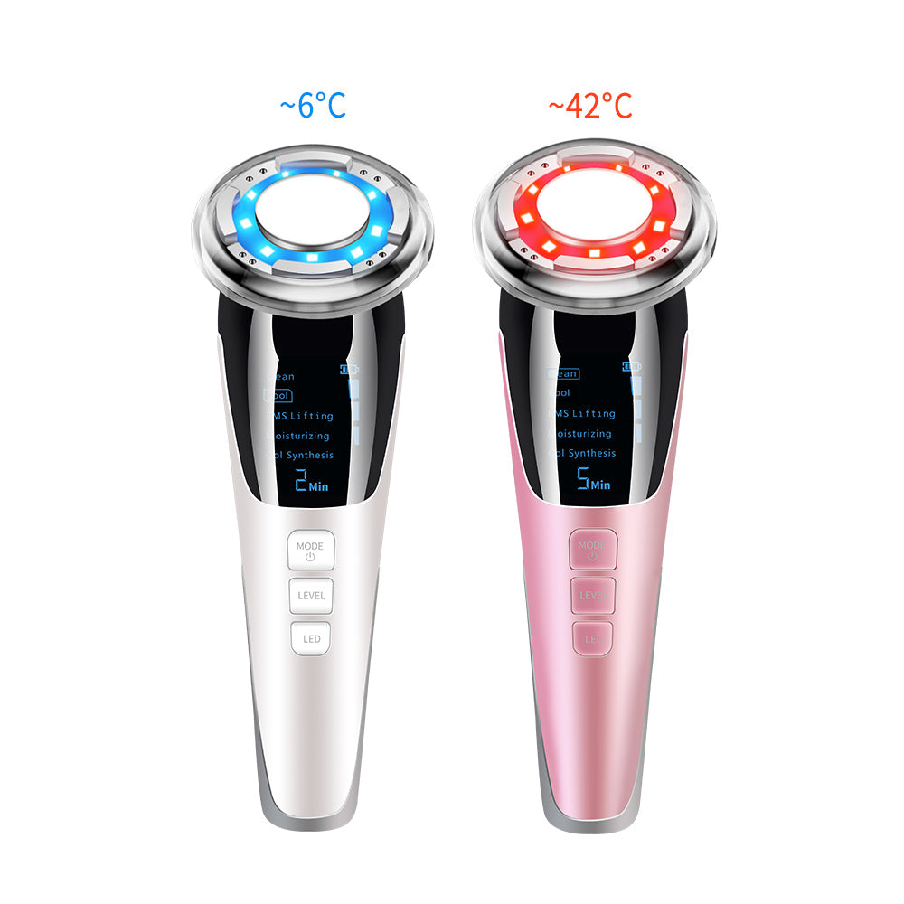 White and pink ultrasonic hot–cold LED facial massager, front view.